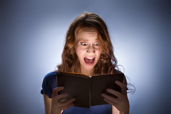 Someone screams while reading a book.