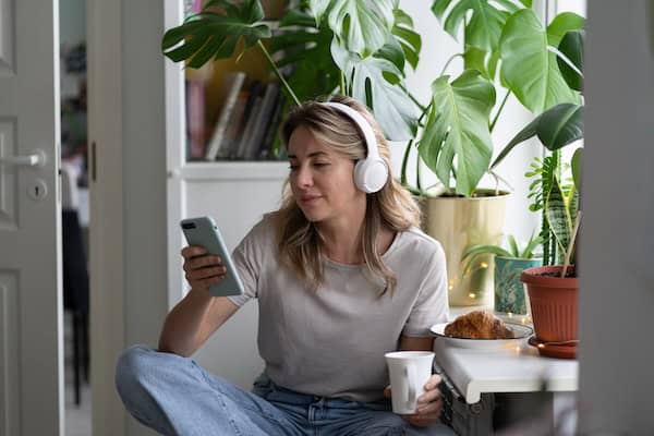 women reading with headphones on